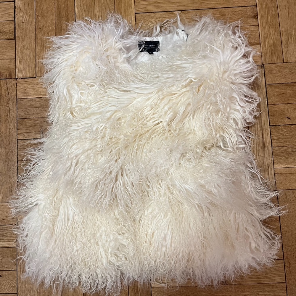 white stylish fur jacket